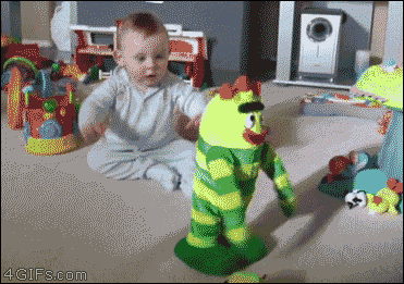 cute-babte-rocking-with-toy.gif