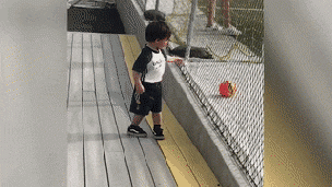 kid hit in face with ball